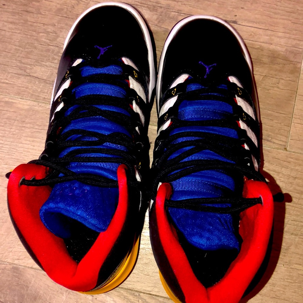 Black,red,blue and yellow white Jordan for women size 5.5